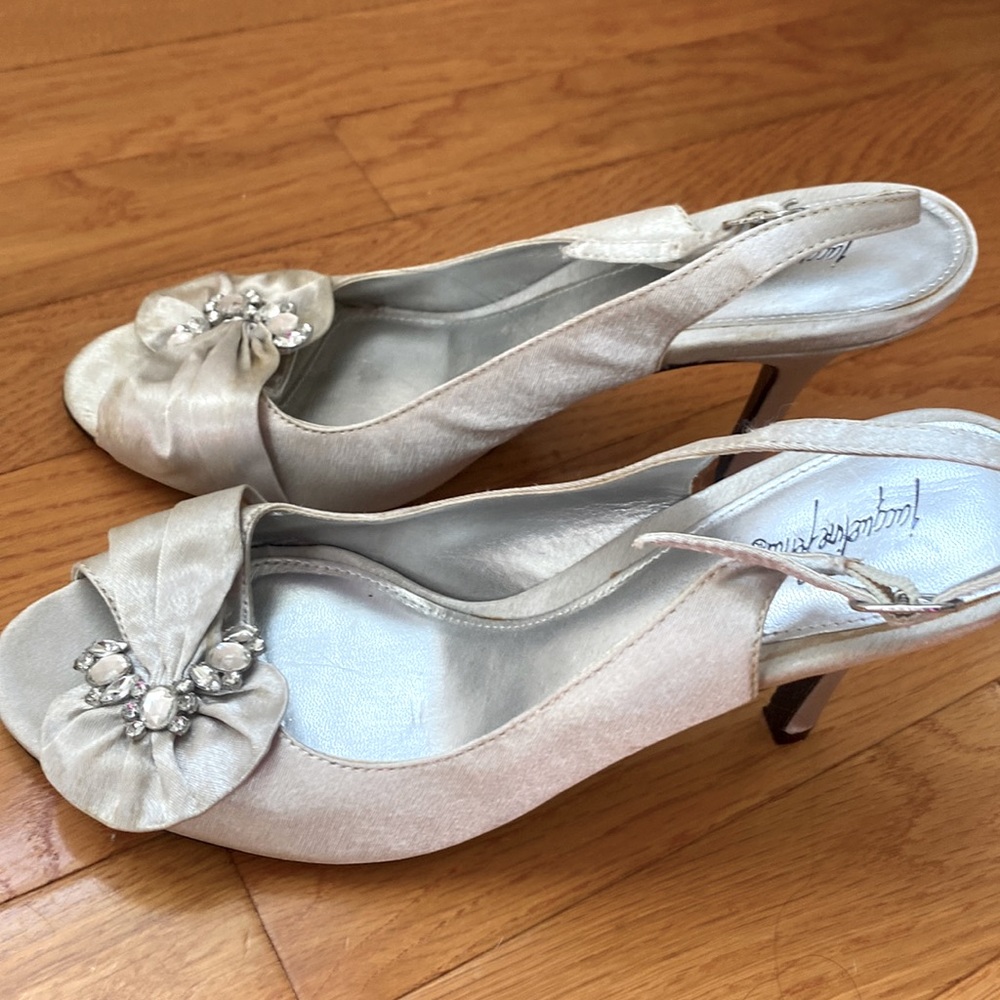 Silver sling back heels with beading at the toe